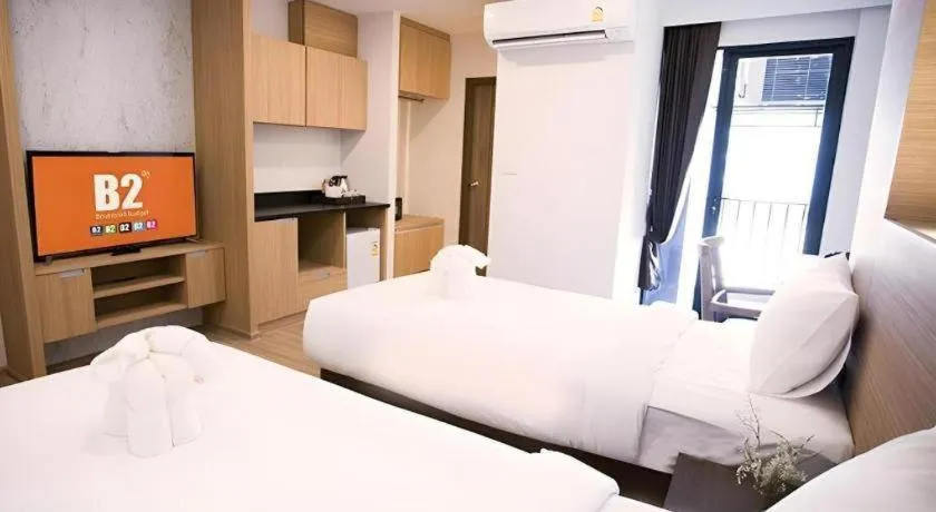 Bed in B2 Amata Nakorn Premier Hotel