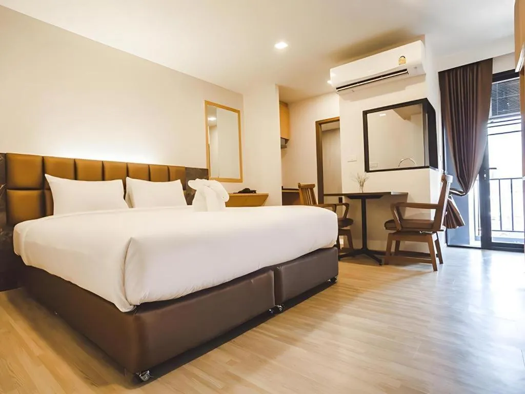 Bed in B2 Amata Nakorn Premier Hotel