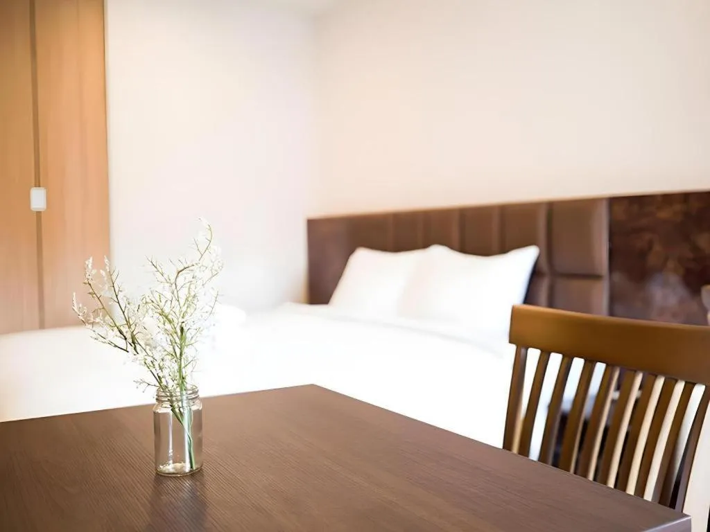 Bed in B2 Amata Nakorn Premier Hotel