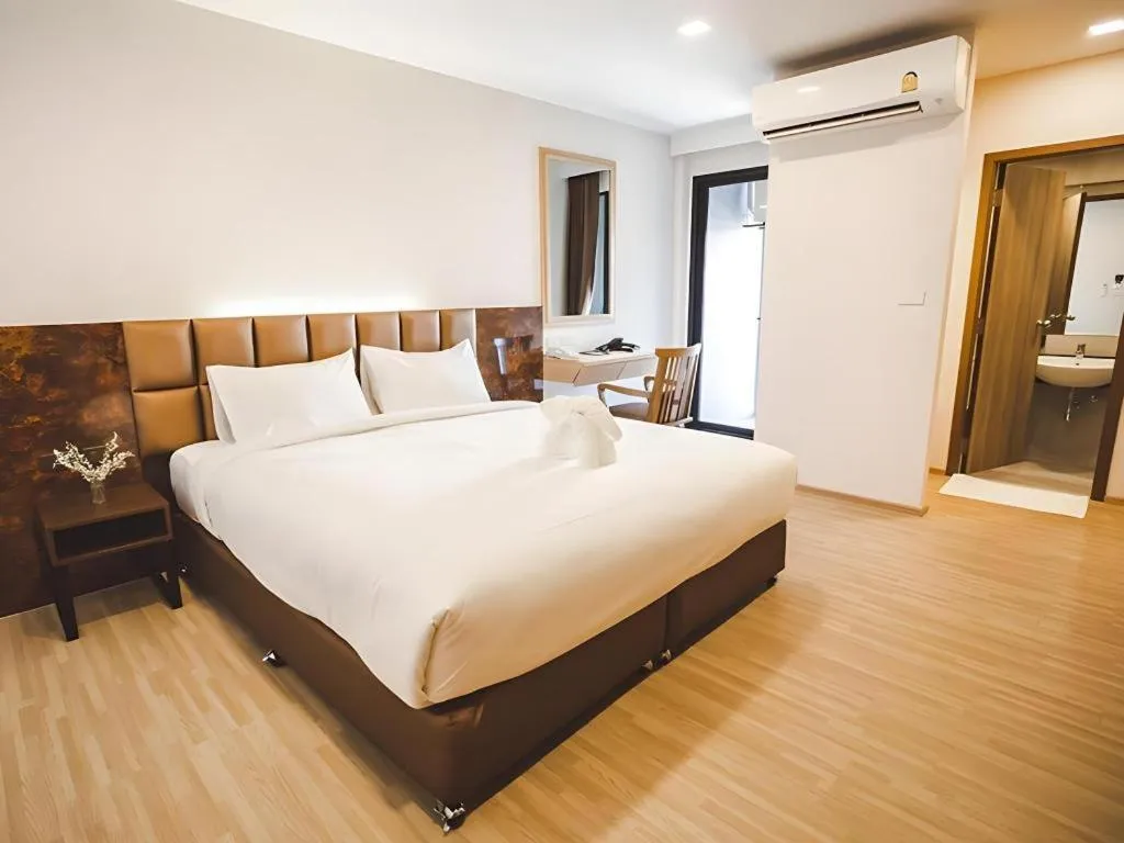 Bed in B2 Amata Nakorn Premier Hotel