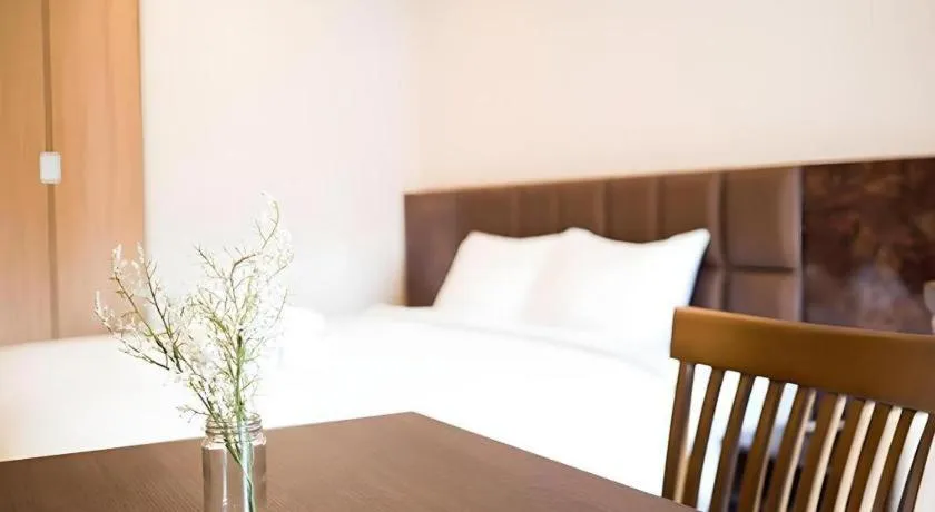 Bed in B2 Amata Nakorn Premier Hotel