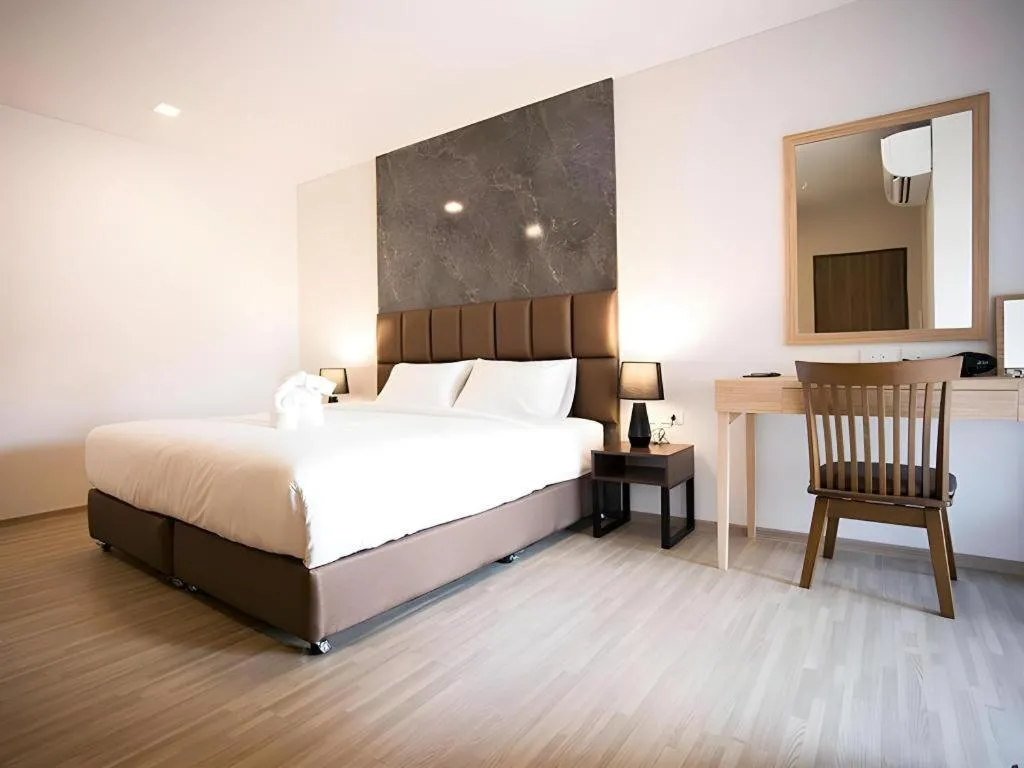 Bed in B2 Amata Nakorn Premier Hotel