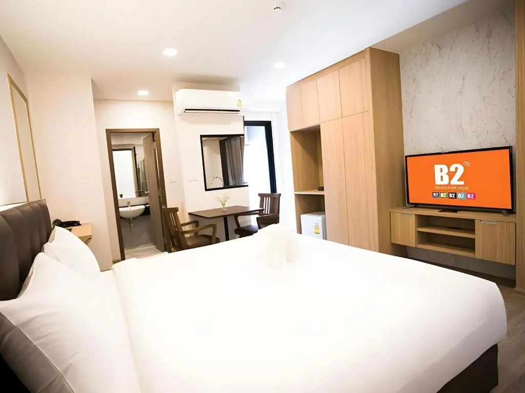 Bed in B2 Amata Nakorn Premier Hotel
