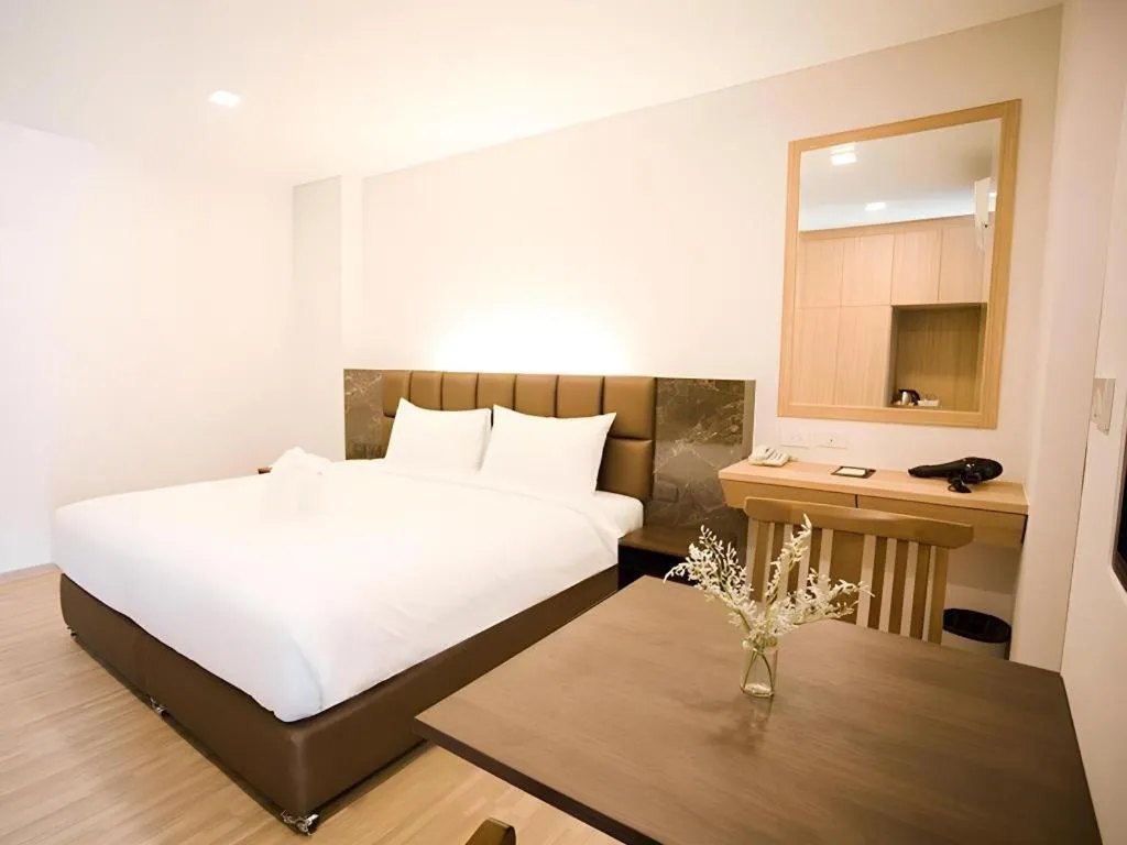 Bed in B2 Amata Nakorn Premier Hotel