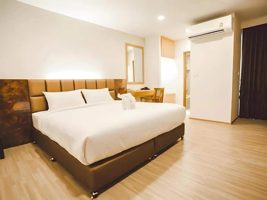 Bed in B2 Amata Nakorn Premier Hotel