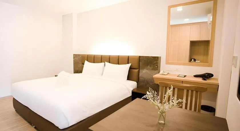 Bed in B2 Amata Nakorn Premier Hotel