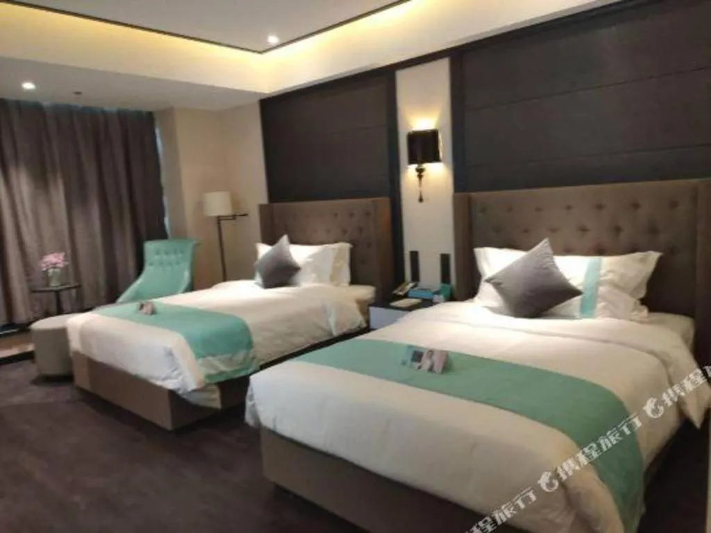 Bed in Xana Hotelle· Wulumuqi High Speed Railway Station Baonengcheng