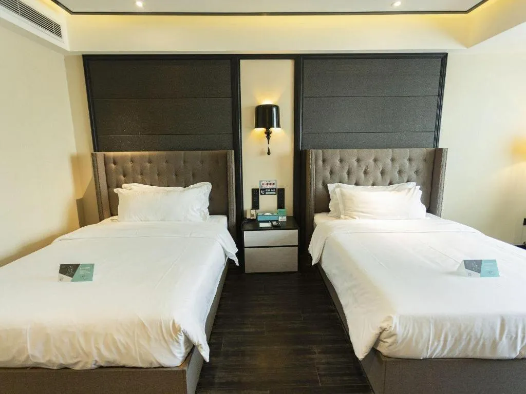 Bed in Xana Hotelle· Wulumuqi High Speed Railway Station Baonengcheng