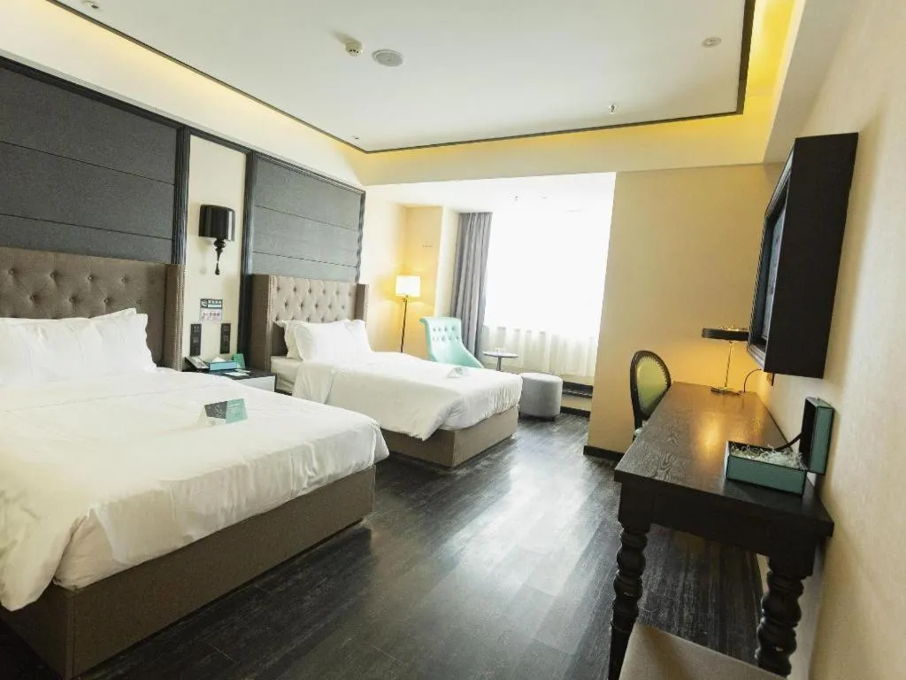 Bed in Xana Hotelle· Wulumuqi High Speed Railway Station Baonengcheng