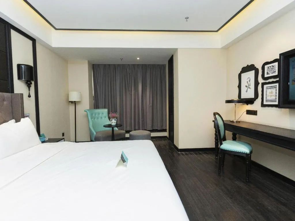 Bed in Xana Hotelle· Wulumuqi High Speed Railway Station Baonengcheng