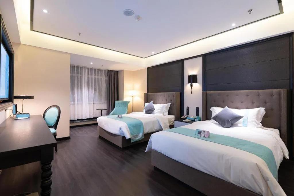 Bed in Xana Hotelle· Wulumuqi High Speed Railway Station Baonengcheng