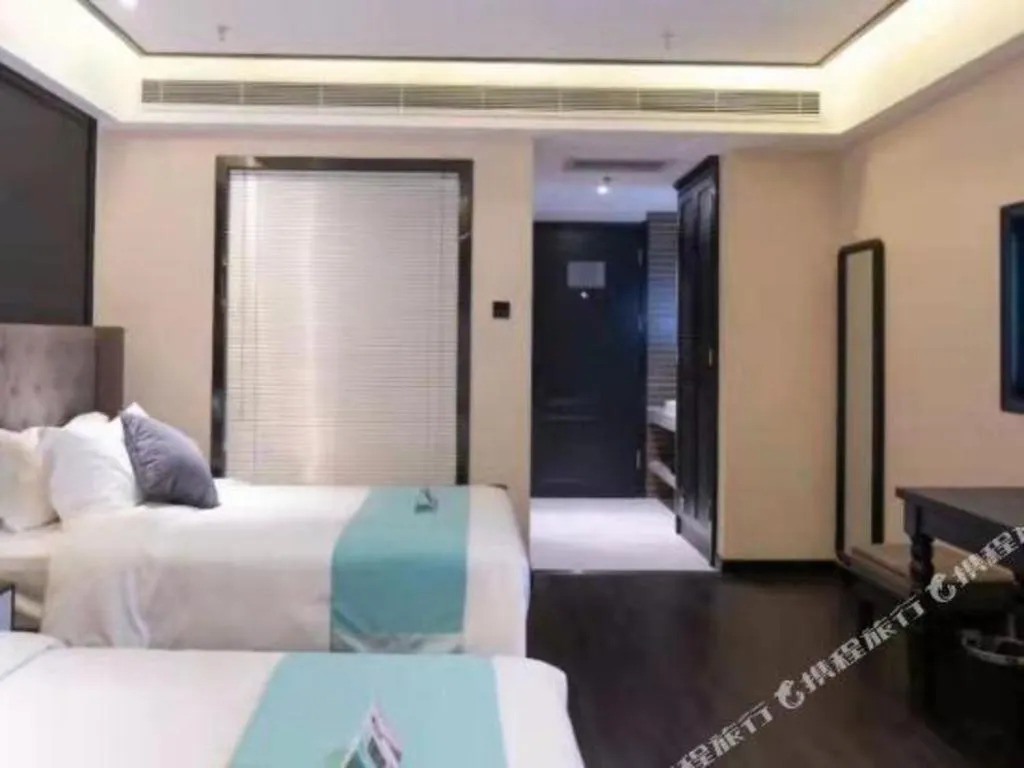 Bed in Xana Hotelle· Wulumuqi High Speed Railway Station Baonengcheng