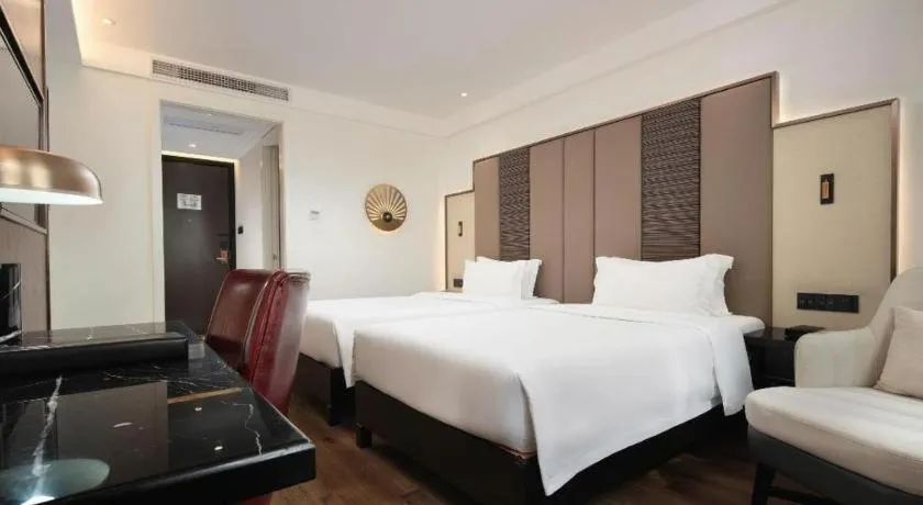 Bed in Jinjiang Metropolo Haikou East High Speed Railway Station Normal University