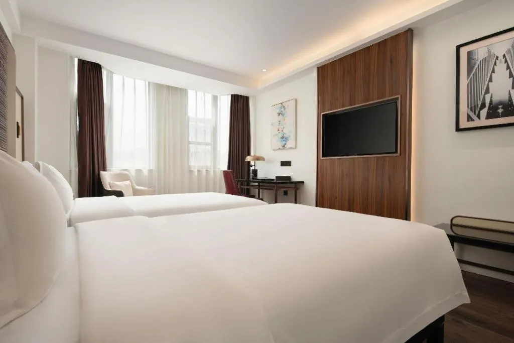 Bed in Jinjiang Metropolo Haikou East High Speed Railway Station Normal University