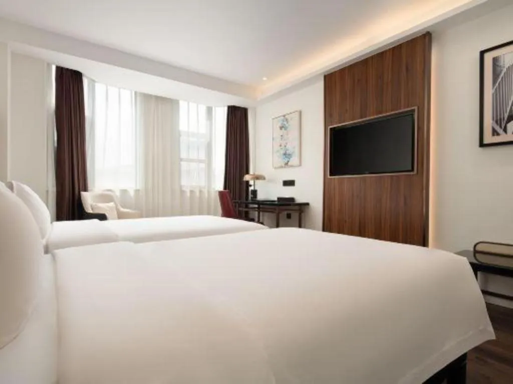 Bed in Jinjiang Metropolo Haikou East High Speed Railway Station Normal University