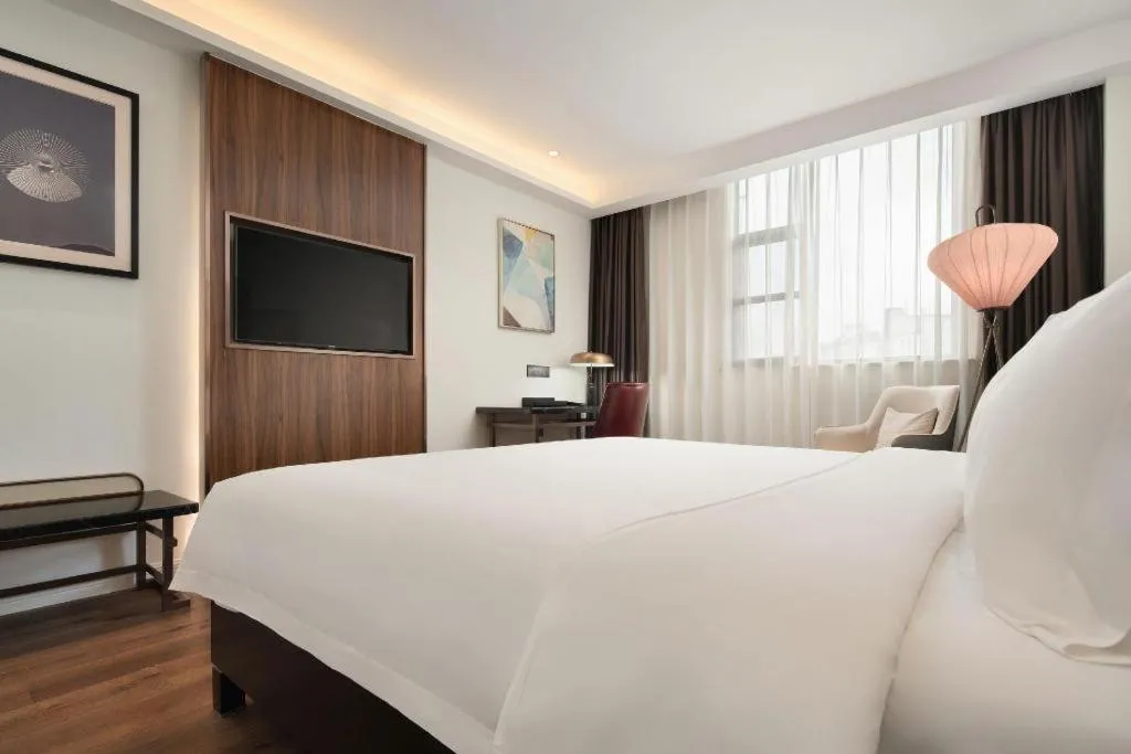 Bed in Jinjiang Metropolo Haikou East High Speed Railway Station Normal University