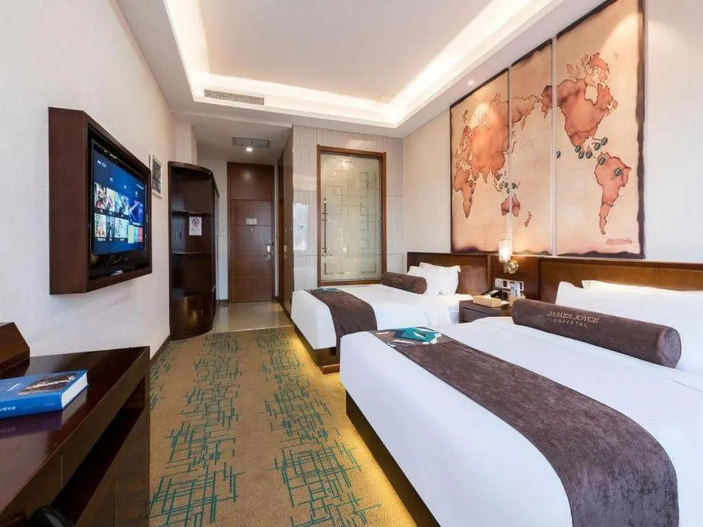 Bed in James Joyce Coffetel· Tianjin Olympic Center Lingbin Road Metro Station