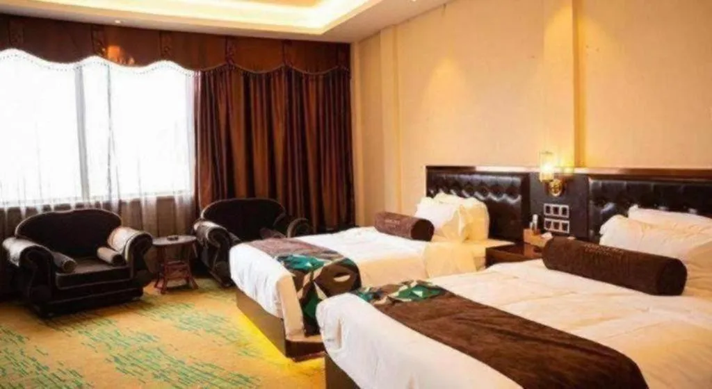 Bed in James Joyce Coffetel· Tianjin Olympic Center Lingbin Road Metro Station