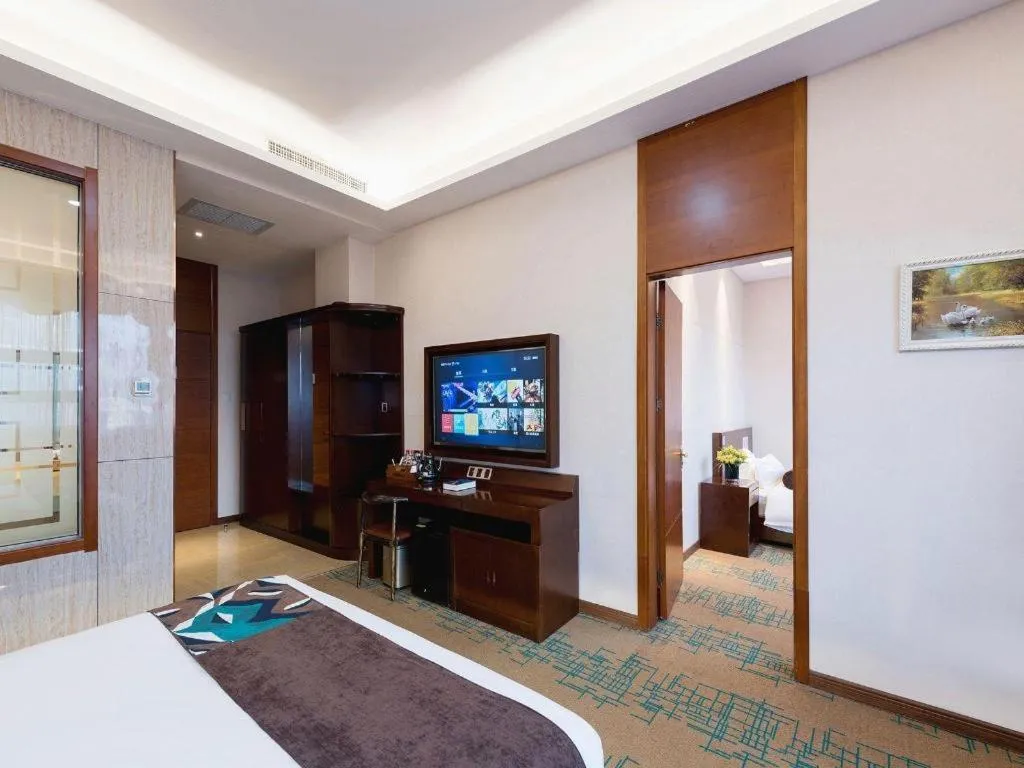 Bed in James Joyce Coffetel· Tianjin Olympic Center Lingbin Road Metro Station