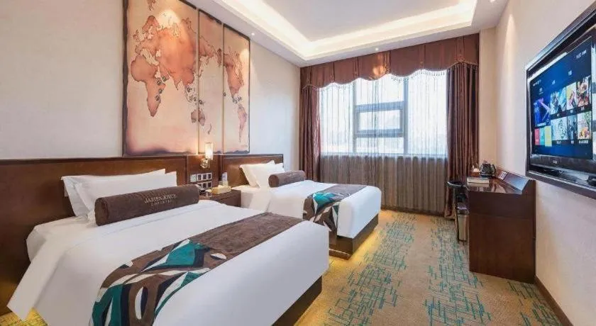 Bed in James Joyce Coffetel· Tianjin Olympic Center Lingbin Road Metro Station