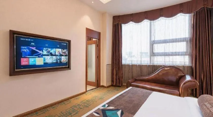 Bed in James Joyce Coffetel· Tianjin Olympic Center Lingbin Road Metro Station