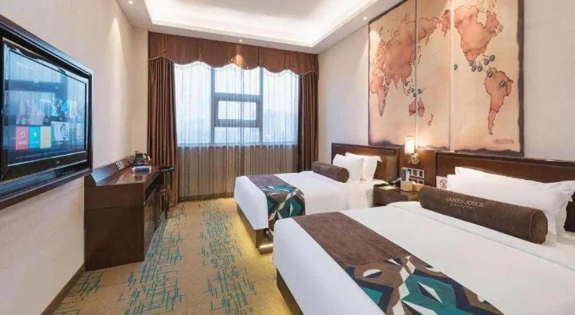 Bed in James Joyce Coffetel· Tianjin Olympic Center Lingbin Road Metro Station