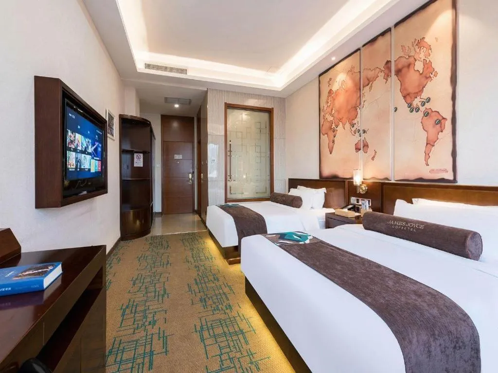 Bed in James Joyce Coffetel· Tianjin Olympic Center Lingbin Road Metro Station