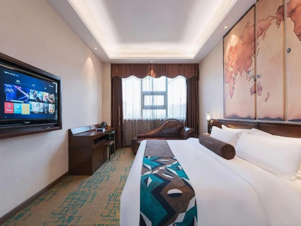 Bed in James Joyce Coffetel· Tianjin Olympic Center Lingbin Road Metro Station