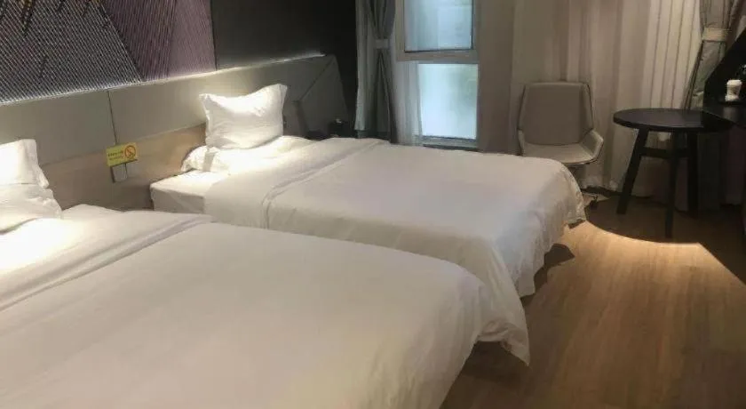 Bed in IU Hotels· Tianjin Houtai Chengjian University Haitai Industrial Park
