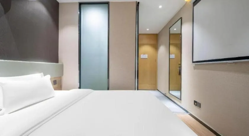 Bed in IU Hotels· Tianjin Houtai Chengjian University Haitai Industrial Park