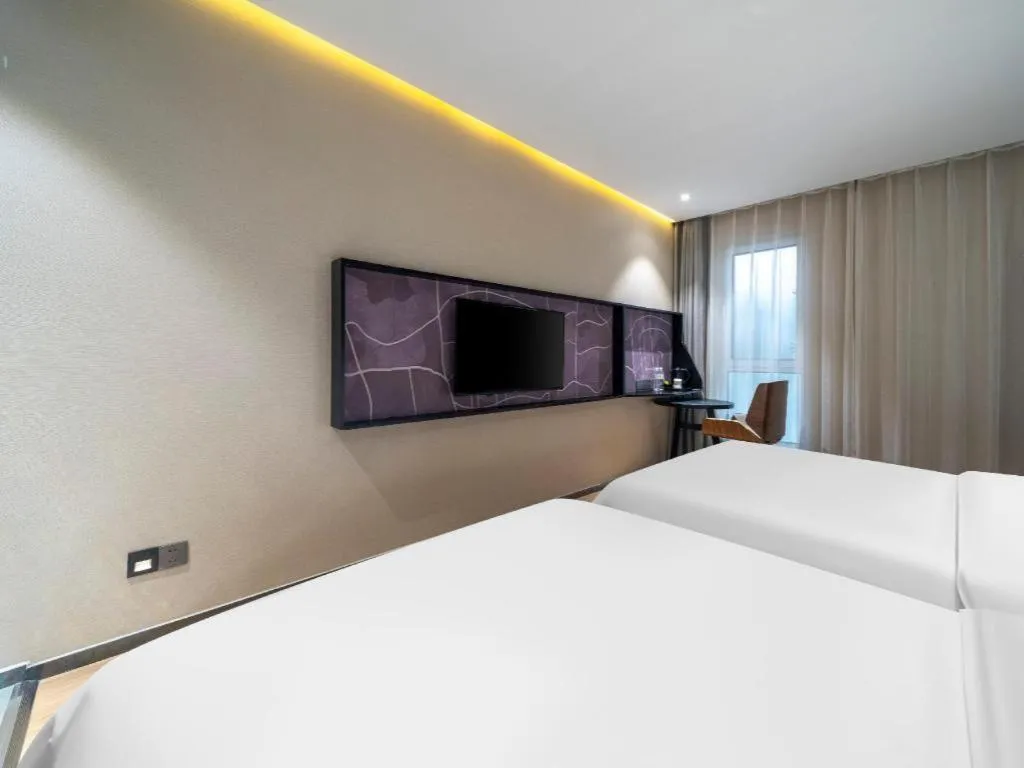 Bed in IU Hotels· Tianjin Houtai Chengjian University Haitai Industrial Park