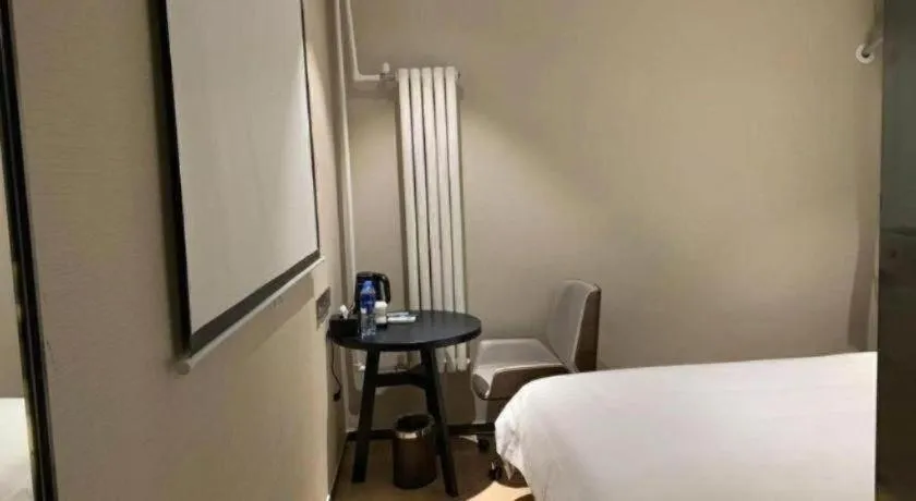 Bed in IU Hotels· Tianjin Houtai Chengjian University Haitai Industrial Park