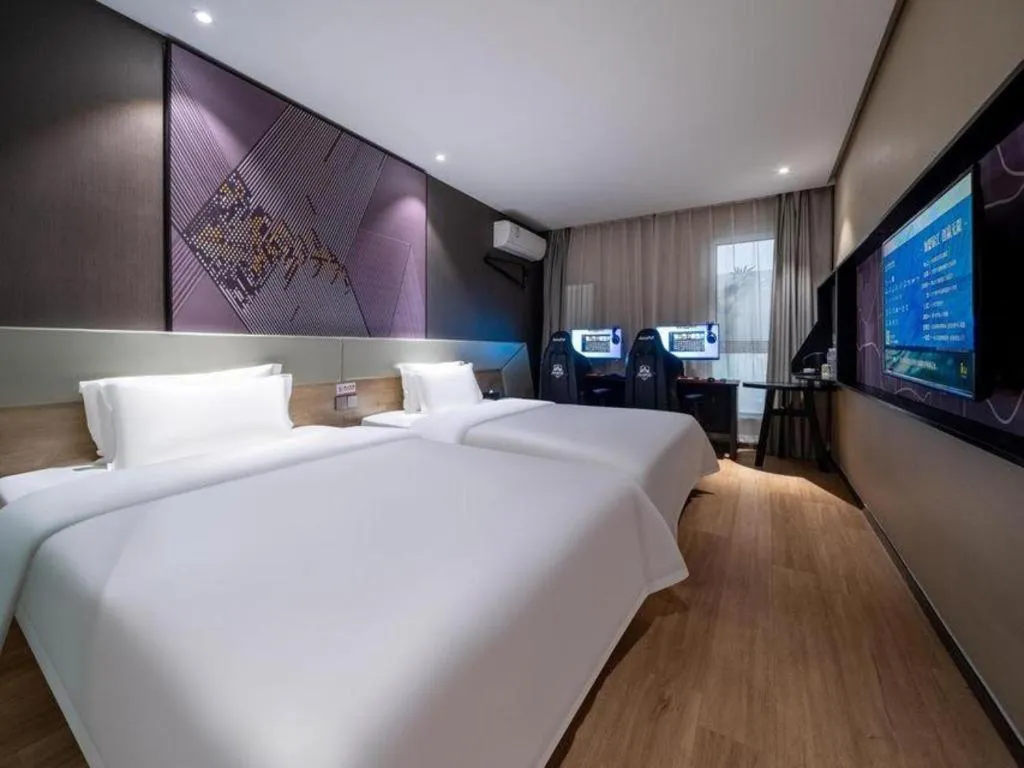 Bed in IU Hotels· Tianjin Houtai Chengjian University Haitai Industrial Park