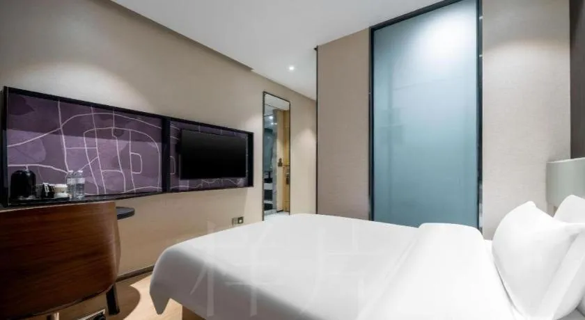 Bed in IU Hotels· Tianjin Houtai Chengjian University Haitai Industrial Park