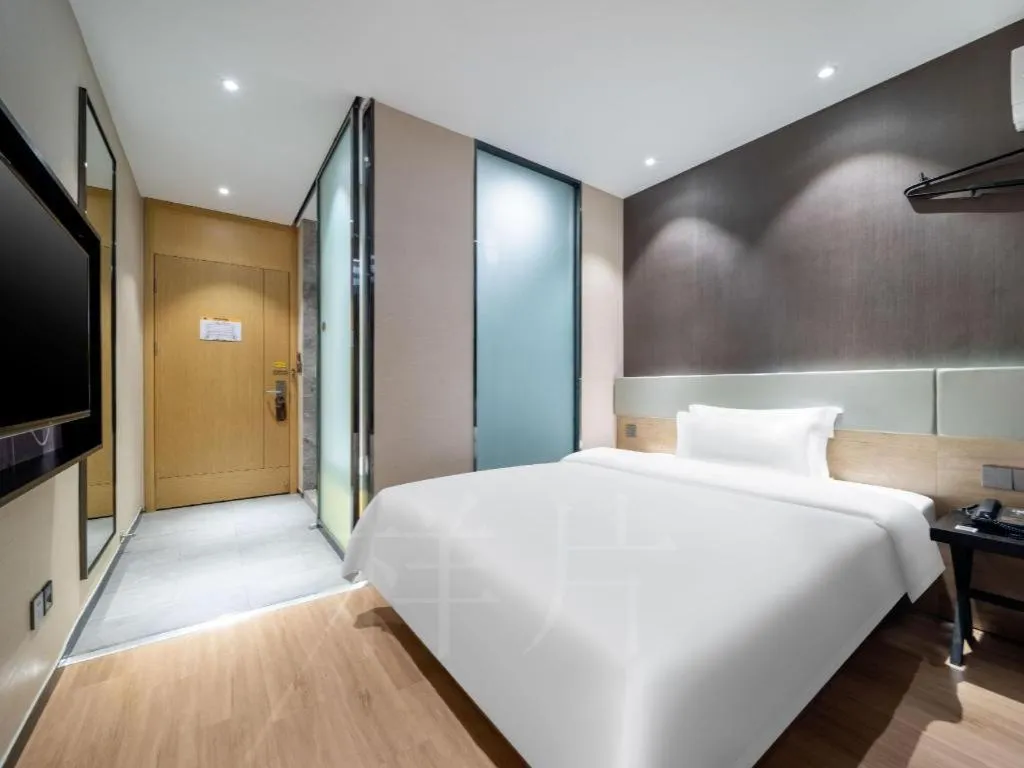 Bed in IU Hotels· Tianjin Houtai Chengjian University Haitai Industrial Park