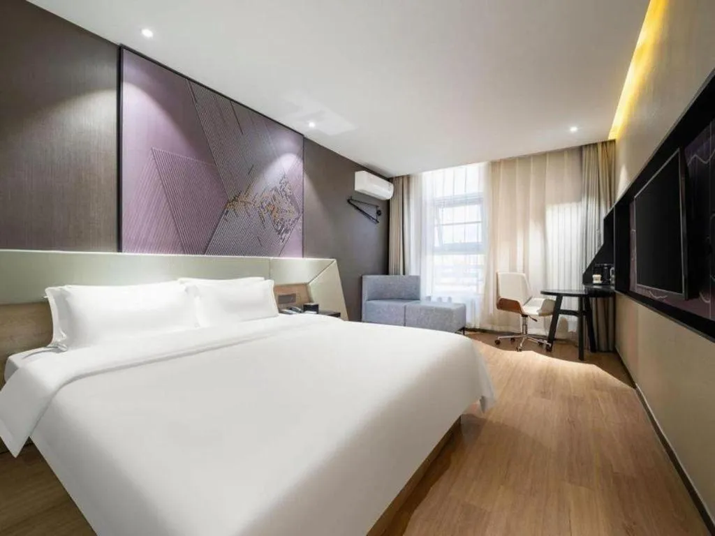 Bed in IU Hotels· Tianjin Houtai Chengjian University Haitai Industrial Park