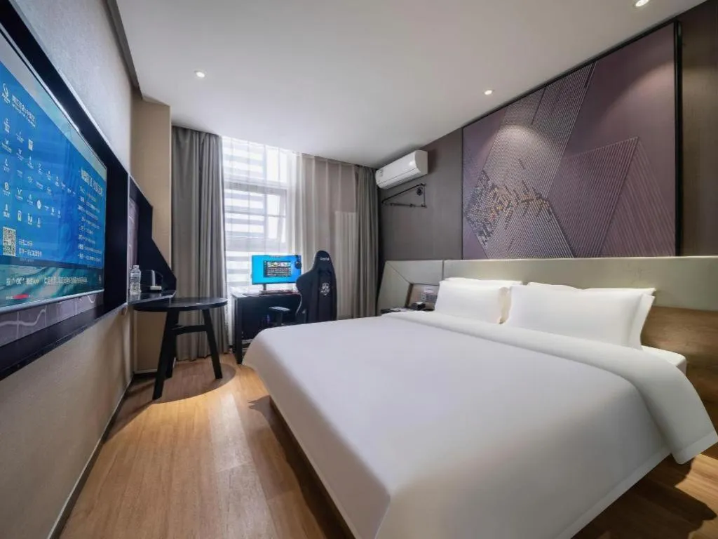 Bed in IU Hotels· Tianjin Houtai Chengjian University Haitai Industrial Park