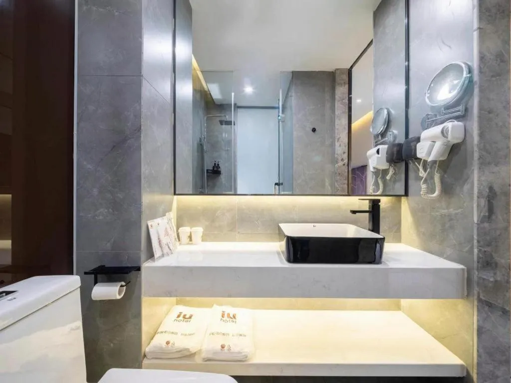 Bed in IU Hotels· Tianjin Houtai Chengjian University Haitai Industrial Park