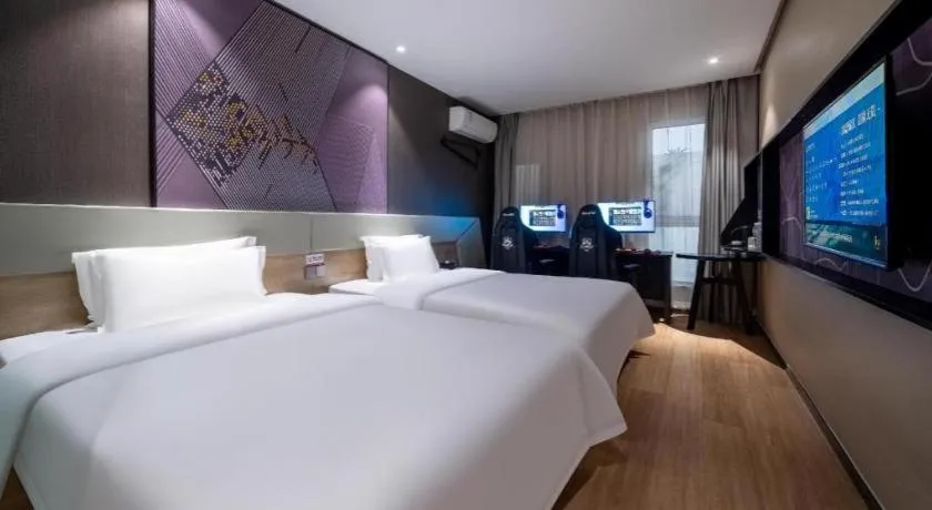 Bed in IU Hotels· Tianjin Houtai Chengjian University Haitai Industrial Park