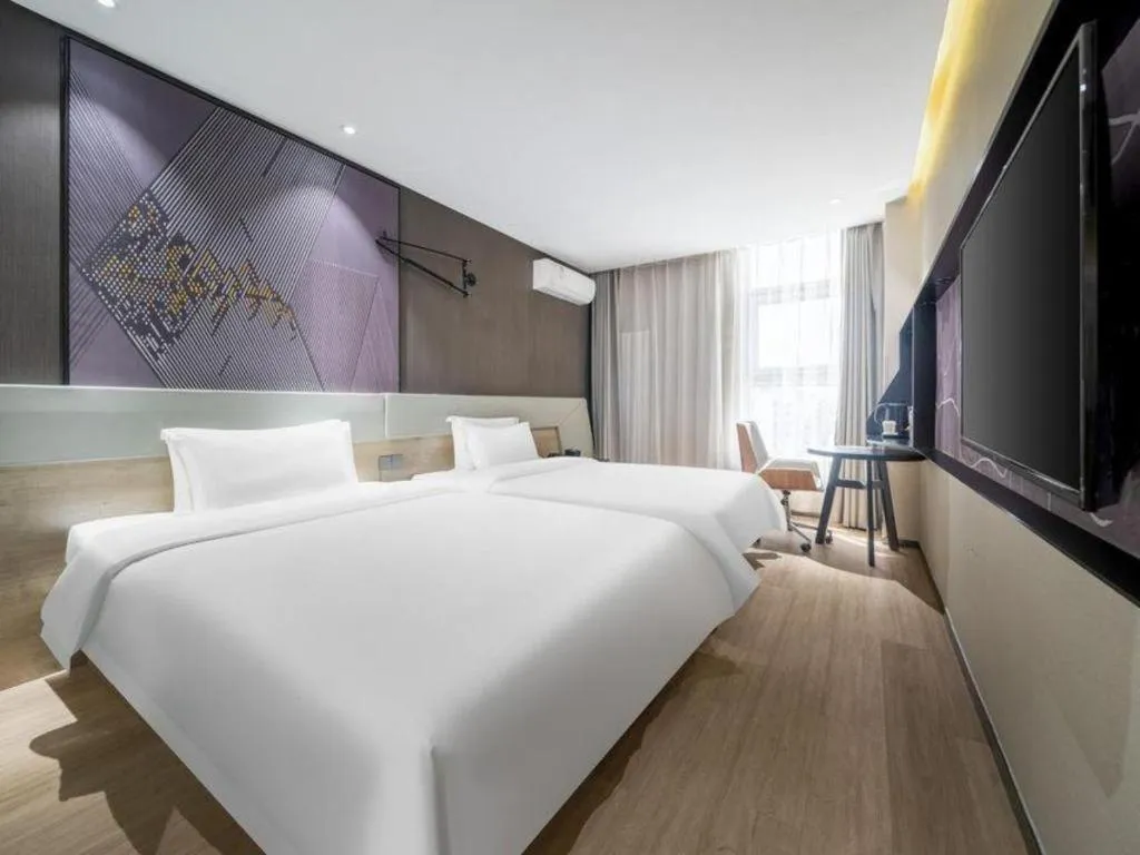 Bed in IU Hotels· Tianjin Houtai Chengjian University Haitai Industrial Park