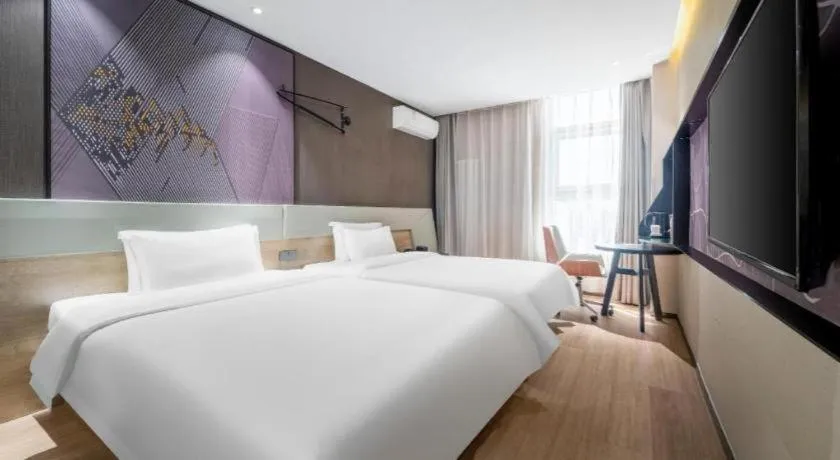 Bed in IU Hotels· Tianjin Houtai Chengjian University Haitai Industrial Park