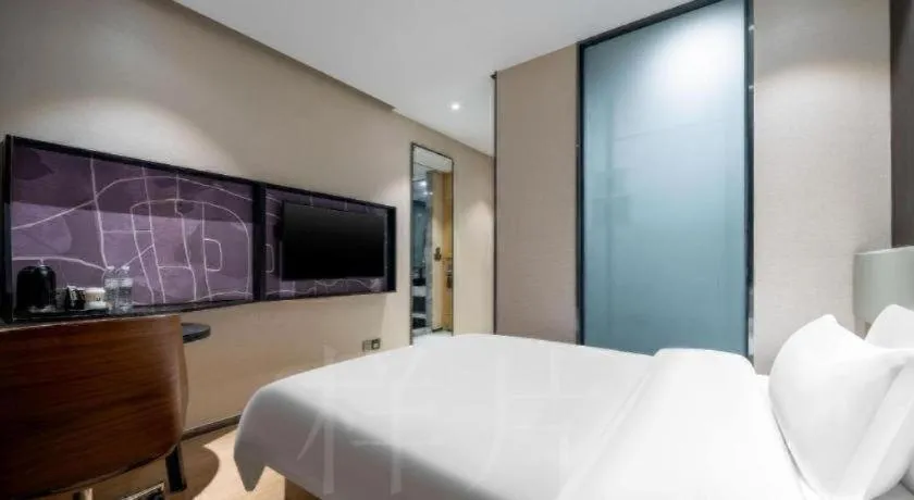 Bed in IU Hotels· Tianjin Houtai Chengjian University Haitai Industrial Park