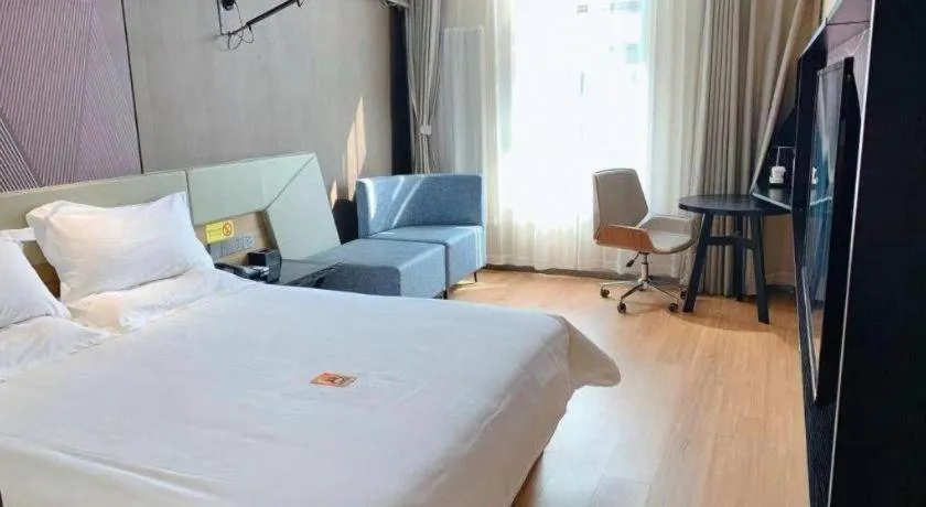 Bed in IU Hotels· Tianjin Houtai Chengjian University Haitai Industrial Park