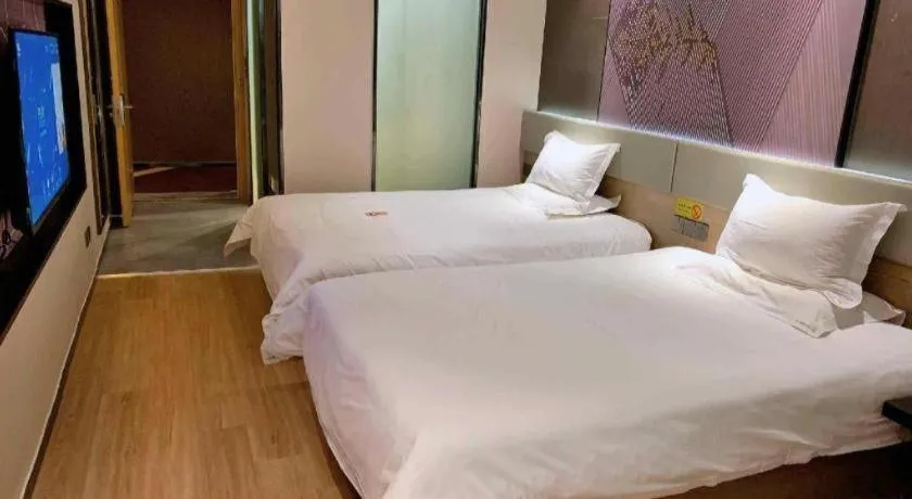 Bed in IU Hotels· Tianjin Houtai Chengjian University Haitai Industrial Park