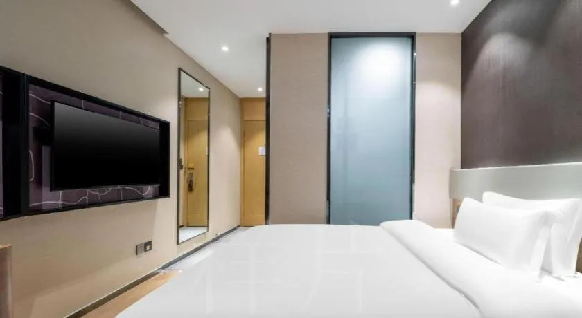 Bed in IU Hotels· Tianjin Houtai Chengjian University Haitai Industrial Park