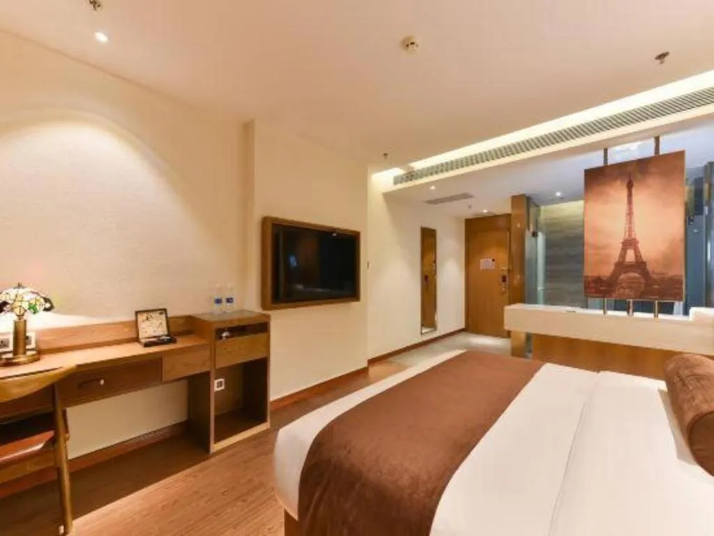 Bed in James Joyce Coffetel Shijiazhuang the Mixc Jinyuan Tower Airport Bus