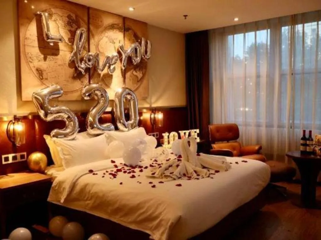 Bed in James Joyce Coffetel Shijiazhuang the Mixc Jinyuan Tower Airport Bus