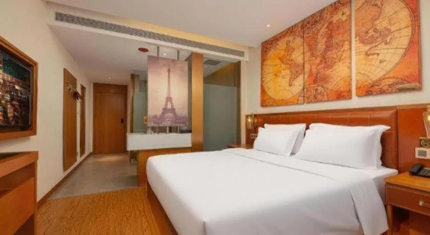 Bed in James Joyce Coffetel Shijiazhuang the Mixc Jinyuan Tower Airport Bus