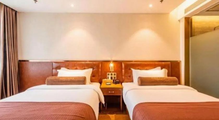 Bed in James Joyce Coffetel Shijiazhuang the Mixc Jinyuan Tower Airport Bus