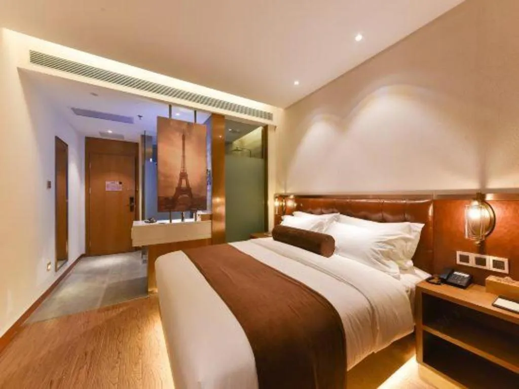Bed in James Joyce Coffetel Shijiazhuang the Mixc Jinyuan Tower Airport Bus